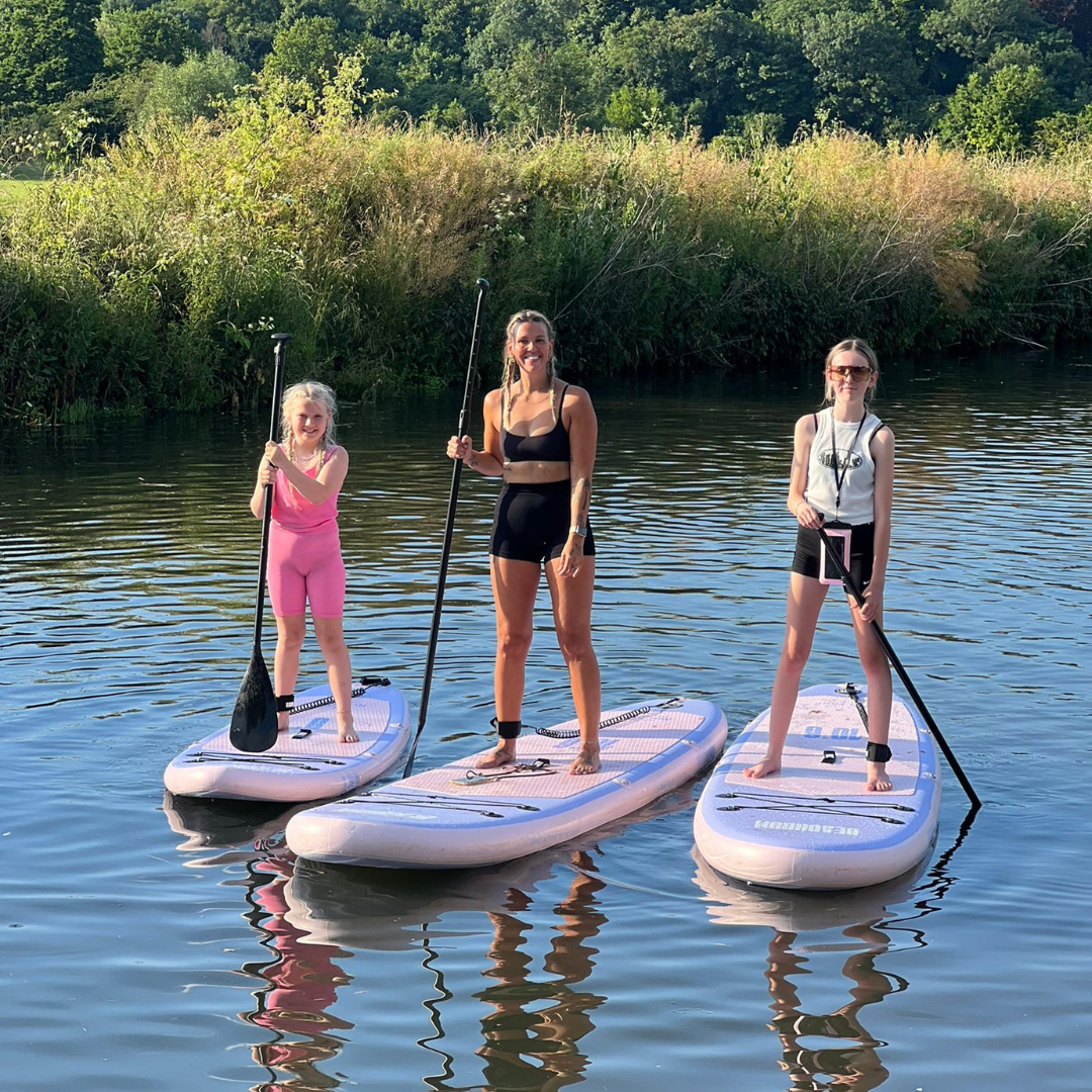 family paddle boarding